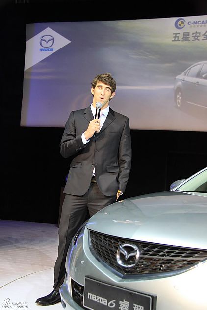 菲尔普斯与高层合影