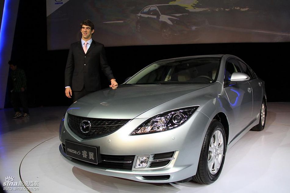 菲尔普斯与高层合影