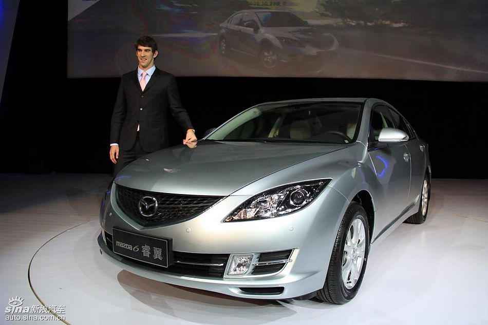 菲尔普斯与高层合影